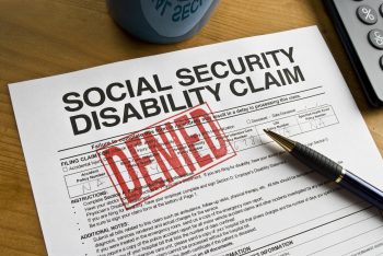 Social Security Disability Claim denied written on paper