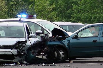 Three damaged vehicles after a serious car accident