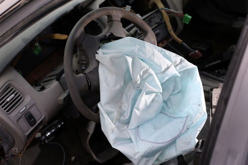Deployed air bag in a car.
