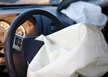 Deployed airbags after a car wreck.