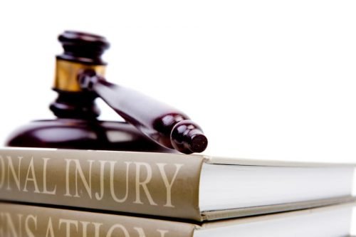 Gavel on book about personal injury